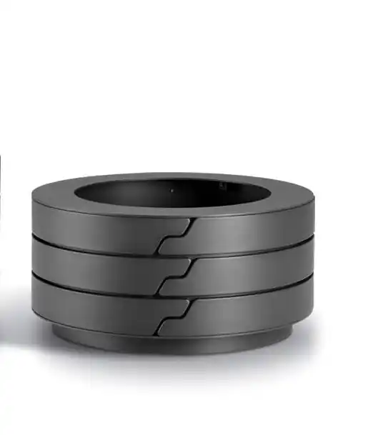 Alt-Text: Stapelbare, moderne Pflanzbehälter in Schwarz, die elegante runde Form betont.